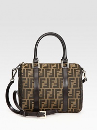 Classic logo canvas jacquard covers this barrel shape, finished with rich leather trim and optional shoulder strap for a versatile style. Double leather top handles, 6 dropAdjustable, detachable leather shoulder strap, 22½-25½ dropOne inside open pocketCotton lining10W X 7½H X 4½DMade in Italy Classic logo canvas jacquard covers this barrel shape, finished with rich leather trim and optional shoulder strap for a versatile style. Double leather top handles, 6 dropAdjustable, detachable leather shoulder strap, 22½-25½ dropOne inside open pocketCotton lining10W X 7½H X 4½DMade in Italy