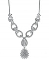 Adorn your neckline with just the right amount of sparkle. This stunning necklace incorporates cut-out links and a pear-shaped sunburst pendant accented by round-cut diamonds (1 ct. t.w.). Set in 14k white gold. Approximate length: 16-1/2 inches. Approximate drop: 1 inch.