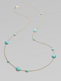 From the Lollipop Collection. Multi-sized, turquoise cabochons, elegantly placed on either side of a radiant, 18k gold chain. Turquoise 18k gold Length around neck, about 37 Diameter, about ¼ - ½ Lobster clasp ImportedPlease note: Due to the characteristics of natural stone, color and pattern may vary slightly. 