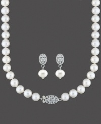 Pretty perfection that's always in style. This beautiful pearl set features cultured freshwater pearl (7-8 mm) earrings and necklace with round-cut diamond accents set in sterling silver. Necklace measures approximately 18 inches. Earring drop measures approximately 1-1/4 inches. Pretty perfection that's always in style. This beautiful pearl set features cultured freshwater pearl (7-8 mm) earrings and necklace with round-cut diamond accents set in sterling silver. Necklace measures approximately 18 inches. Earring drop measures approximately 1-1/4 inches.