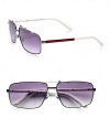 A pair of metal frames with sporty red and white accents and a temple logo detail.Gray gradient lens100% UV protectiveMade in Italy