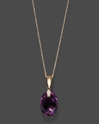 Diamonds accent a faceted amethyst, set in 14K rose gold. Diamonds accent a faceted amethyst, set in 14K rose gold.