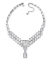 Exquisite and extraordinary. Make a showstopping statement at your next special occasion with Swarovski's clear crystal baguette necklace. Art Deco-inspired and dazzling by design, it's crafted in silver tone mixed metal. Approximate length: 13-3/4 inches + 2-inch extender. Approximate drop: 2-1/2 inches.