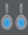 Tantalize the senses with this tasteful style. Carlo Viani's delightfully dramatic drop earrings feature oval-cut turquoise (8 mm) surrounded by rings of round-cut blue topaz (1-1/3 ct. t.w.) and white sapphire (2-1/2 ct. t.w.). Crafted in 14k white gold. Approximate drop: 1-1/2 inches.
