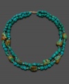 Adorn your neckline with the raw, untouched beauty of turquoise chips (6-7 mm). Double-strand necklace set in 14k gold. Approximate length: 18 inches.
