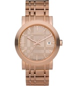 This Burberry watch features a check-inspired rose gold ion-plated stainless steel bracelet and round case. Rose gold tone dial with check pattern features applied stick indices, minute track, date window at three o'clock, three hands and logo. Swiss made. Quartz movement. Water resistant to 50 meters. Two-year limited warranty.