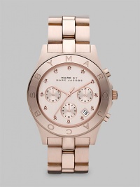 This warm rose goldtone chronograph boasts crystal markers and a signature bezel. Quartz movementWater resistant to 5 ATMRound rose goldtone ion-plated stainless steel case, 40mm (1.6)Logo etched bezelRose goldtone chronograph dialCrystal markersDate function between 4 & 5 o'clockSecond hand Rose goldtone ion-plated stainless steel link bracelet, 20mm wide (0.8)Imported This warm rose goldtone chronograph boasts crystal markers and a signature bezel. Quartz movementWater resistant to 5 ATMRound rose goldtone ion-plated stainless steel case, 40mm (1.6)Logo etched bezelRose goldtone chronograph dialCrystal markersDate function between 4 & 5 o'clockSecond hand Rose goldtone ion-plated stainless steel link bracelet, 20mm wide (0.8)Imported
