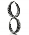 Practice contrast. A striking design made from braided black and white plastic vinyl make these Style&co. hoop earrings a fashionista's fave. Setting and lever clasp crafted in mixed metal. Approximate diameter: 2-1/2 inches.