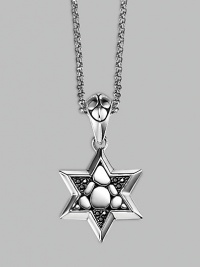 A stunningly appointed Star of David pendant, accented by black sapphires on a silver chain necklace. From the Kali Collection Silver Black sapphires, 0.216 tcw Pendant, ¾W X 1½H Necklace, 36 long Lobster clasp Imported 