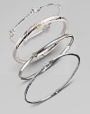 A slender sterling silver bangle accented with five radiant diamonds. Diamonds, 0.15 tcw Sterling silver Diameter, about 2½ Imported Please note: Bracelets sold separately.