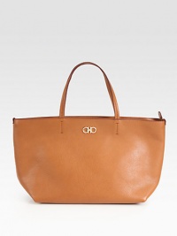 An easy shape for all of your essentials in richly-textured pebble-grain Italian leather. Double leather top handles, 8 dropFlap strap over top-zip closureInner zip pouchMetallic leather lining18¼W X 10H X 6DMade in Italy An easy shape for all of your essentials in richly-textured pebble-grain Italian leather. Double leather top handles, 8 dropFlap strap over top-zip closureInner zip pouchMetallic leather lining18¼W X 10H X 6DMade in Italy