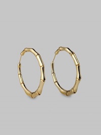 Bold bamboo-textured hoops, exquisitely crafted of gleaming 18k yellow gold. 18k yellow gold Diameter, about 2¼ Pierced Made in Italy Bold bamboo-textured hoops, exquisitely crafted of gleaming 18k yellow gold. 18k yellow gold Diameter, about 2¼ Pierced Made in Italy