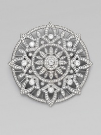 A circular design with a multi-leaf motif embellished in beautiful stones. Rhodium plated brassCrystalsCubic zirconiaSize, about 2½Pin backImported 