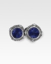A rich, welcome burst of color in smooth lapis stones, set into engraved sterling silver. ¾ dia Made in USA