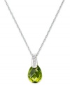 Take your look to the next level with the right amount of color. A pear-cut peridot (2-1/5 ct. t.w.) adds the sparkle to this shining 14k white gold necklace with diamond accents at the bail. Approximate length: 18 inches. Approximate drop: 1/2 inch.