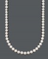 Enrich your wardrobe with a luxurious strand of pearls. This polished Belle de Mer necklace features AA+ cultured freshwater pearls (11-12 mm) with a 14k gold clasp. Approximate length: 24 inches.