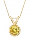 Add a touch of sunshine-bright color. A round-cut, bezel-set yellow diamond (1 ct. t.w.) shines in a luminous 14k gold setting. Approximate length: 18 inches. Approximate drop: 1/2 inch.