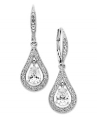 Beautiful and brilliant, this pair of teardrop earrings from Eliot Danori glistens with crystal and cubic zirconias (2 ct. t.w.). Crafted from rhodium-plated brass. Approximate drop: 3/4 inches. Beautiful and brilliant, this pair of teardrop earrings from Eliot Danori glistens with crystal and cubic zirconias (2 ct. t.w.). Crafted from rhodium-plated brass. Approximate drop: 3/4 inches.