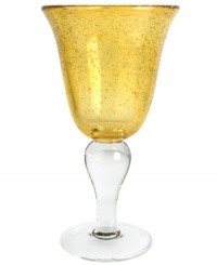 The eye-catching Iris goblet makes a big impact in any setting with a fresh citrine color and tiny bubbles trapped in dishwasher-safe glass. From Artland. The eye-catching Iris goblet makes a big impact in any setting with a fresh citrine color and tiny bubbles trapped in dishwasher-safe glass. From Artland.