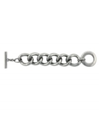 A simple layer with a modern edge. Vince Camuto's thick chain link bracelet will become a staple in your wardrobe for years to come. Crafted in silver tone mixed metal. Approximate length: 8 inches. A simple layer with a modern edge. Vince Camuto's thick chain link bracelet will become a staple in your wardrobe for years to come. Crafted in silver tone mixed metal. Approximate length: 8 inches.