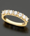 Exquisite beauty, timeless design. 14k gold ring features seven round-cut diamonds (1 ct. t.w.).