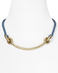 Mixed materials make a strong statement on this collar necklace from Giles & Brother. It's braided leather lends an artisan edge, while a pair of gleaming knots make a subtle nod to nautical style. Mixed materials make a strong statement on this collar necklace from Giles & Brother. It's braided leather lends an artisan edge, while a pair of gleaming knots make a subtle nod to nautical style.