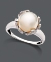 A polished pearl is the focal point of this fresh flower. Ring by Belle de Mer features a smooth sterling silver band and setting with sparkling, diamond-accented petals and a cultured freshwater pearl center (10-11 mm). Size 7.