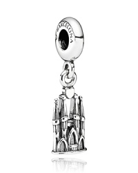 Barcelona's La Sagrada Familia is captured in shining sterling silver in this charm from PANDORA. Barcelona's La Sagrada Familia is captured in shining sterling silver in this charm from PANDORA.