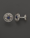 Elegant, intricately textured sterling silver cufflinks, set with sapphires, from Buccellati.