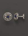 Elegant, intricately textured sterling silver cufflinks, set with sapphires, from Buccellati.