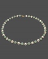 Look pretty in elegant pastels. This gorgeous necklace features cultured freshwater pearl (8 - 8-1/2 mm) and jade (8 mm) set in 14k gold. Approximate length: 18 inches.