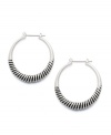 Stylish and savvy. These hoop earrings by Alfani boast an extra hint of texture in a silver tone and hematite tone mixed metal setting. Approximate diameter: 1-5/16 inches.
