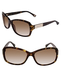 Stylish sunglasses with a rectangular logo plaque at temples for the ultimate MICHAEL Michael Kors look. Stylish sunglasses with a rectangular logo plaque at temples for the ultimate MICHAEL Michael Kors look.