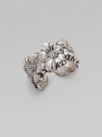 Nature takes center stage with this beautiful, adjustable design featuring a row of pretty flowers. Sterling silverWidth, about ½Adjustable up to ½ sizeMade in Italy Nature takes center stage with this beautiful, adjustable design featuring a row of pretty flowers. Sterling silverWidth, about ½Adjustable up to ½ sizeMade in Italy