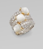 A statement piece with three mother-of-pearl sugarloafs set in white sapphire encrusted sterling silver with 18k gold accents. Mother-of-pearlWhite sapphireSterling silver18k goldWidth, about 1Imported