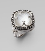 An ornate design with a faceted mother-of-pearl doublet, overlaid with a sterling silver clover window and surrounded by a delicate band of dots. Mother-of-pearl doubletsSterling silverWidth, about ¼Imported 