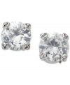 Lock up your new look. These stud earrings from Fossil showcase unique key shaped prongs that cradle a sparkling, round-cut cubic zirconia stone. Crafted in silver tone mixed metal. Approximate drop: 3/8 inch.