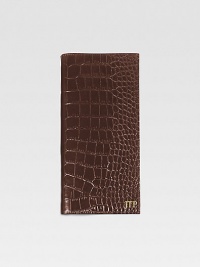 A travel essential crafted of crocodile-embossed Italian calfskin, this handsome design has a ticket compartment, six credit card slots and one slot for passport. Keeps all travel papers organized and handy About 3½ X 9¼ Made in USAFOR PERSONALIZATIONSelect a color and quantity, then scroll down and click on PERSONALIZE & ADD TO BAG to choose and preview your personalization options. Please allow 1 week for delivery. A travel essential crafted of crocodile-embossed Italian calfskin, this handsome design has a ticket compartment, six credit card slots and one slot for passport. Keeps all travel papers organized and handy About 3½ X 9¼ Made in USAFOR PERSONALIZATIONSelect a color and quantity, then scroll down and click on PERSONALIZE & ADD TO BAG to choose and preview your personalization options. Please allow 1 week for delivery.