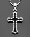 A twist on traditional. This stainless steel and black rubber cross pendant features silvertone bolts for a trendy effect. Chain measures 30 inches; drop measures 3 inches.