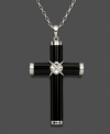 A dramatic interpretation of a traditional cross pendant. Tubular black onyx (7 mm) wrapped in sterling silver accents makes quite an impact. Necklace crafted in sterling silver. Approximate length: 18 inches. Approximate drop:1-1/4 inches.