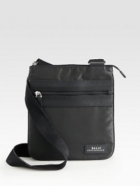 A stylish, versatile crossbody bag perfect for the man on-the-go, crafted in smooth, resilient nylon with signature logo detail.Zip closureAdjustable shoulder strapExterior, interior zip pocketsNylon10W x 11HMade in Italy A stylish, versatile crossbody bag perfect for the man on-the-go, crafted in smooth, resilient nylon with signature logo detail.Zip closureAdjustable shoulder strapExterior, interior zip pocketsNylon10W x 11HMade in Italy