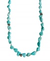 Free-flowing and totally fashionable. Lucky Brand's stylish strandage necklace combines reconstituted turquoise nuggets with mixed metal charms for a trendy layered look. Approximate length: 27 inches + 2-inch extender.