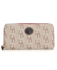 Dooney & Bourke offers a demure display of signature practicality with this classic wallet. Featuring the iconic emblem and signature jacquard exterior, this wallet will seamlessly carry over from season to season. Dooney & Bourke offers a demure display of signature practicality with this classic wallet. Featuring the iconic emblem and signature jacquard exterior, this wallet will seamlessly carry over from season to season.