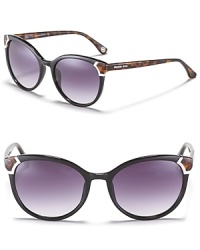 Classic cat eye sunglasses with metal embellishments at temples and contrast arms. Classic cat eye sunglasses with metal embellishments at temples and contrast arms.