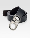 Black on one side and hickory on the other, this reversible belt crafted in smooth Italian leather with double gancini buckle, will be a stylish, versatile addition to your existing wardrobe.LeatherAbout 1½ wideMade in Italy