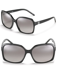 Lounge pool-side in these chic oversized square sunglasses from Fendi. Lounge pool-side in these chic oversized square sunglasses from Fendi.