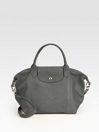 A supple leather rendition of the ever-popular nylon design with versatile detachable strap.Double top handles, 4½ dropDetachable shoulder strap, 17½ dropTop zip closure with magnetic snap flapOne inside zip pocketTwo inside open pocketsFully lined10W X 9H X 6¼DImported A supple leather rendition of the ever-popular nylon design with versatile detachable strap.Double top handles, 4½ dropDetachable shoulder strap, 17½ dropTop zip closure with magnetic snap flapOne inside zip pocketTwo inside open pocketsFully lined10W X 9H X 6¼DImported