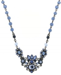 Baby blue hues, girly glamour. Flaunt your femininity with this dazzling necklace by 2028 featuring a floral pendant of blue crystals suspended from a chain decked out in midnight blue accent beads. Crafted in mixed metal. Approximate length: 16 inches + 3-inch extender. Approximate drop: 1 inch. Baby blue hues, girly glamour. Flaunt your femininity with this dazzling necklace by 2028 featuring a floral pendant of blue crystals suspended from a chain decked out in midnight blue accent beads. Crafted in mixed metal. Approximate length: 16 inches + 3-inch extender. Approximate drop: 1 inch.