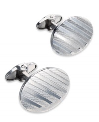 The perfect accent for the modern-day business man. These sleek oval-shaped cuff links feature a trendy striped design in sterling silver. Approximate length: 1-7/8 inches. Approximate width: 5/8 inch. The perfect accent for the modern-day business man. These sleek oval-shaped cuff links feature a trendy striped design in sterling silver. Approximate length: 1-7/8 inches. Approximate width: 5/8 inch.