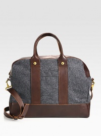 A handsome design for the globe-trotting gentleman, this well-crafted duffel is an ideal choice for heavy-duty day trips to weekend getaways, crafted in a rich cotton with gold hardware and a smooth leather trim for a refined finish.Zip closureDouble top handlesDetachable shoulder strapCotton17W x 13H x 8DImported A handsome design for the globe-trotting gentleman, this well-crafted duffel is an ideal choice for heavy-duty day trips to weekend getaways, crafted in a rich cotton with gold hardware and a smooth leather trim for a refined finish.Zip closureDouble top handlesDetachable shoulder strapCotton17W x 13H x 8DImported